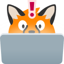 A blobfox looking surprised at a computer